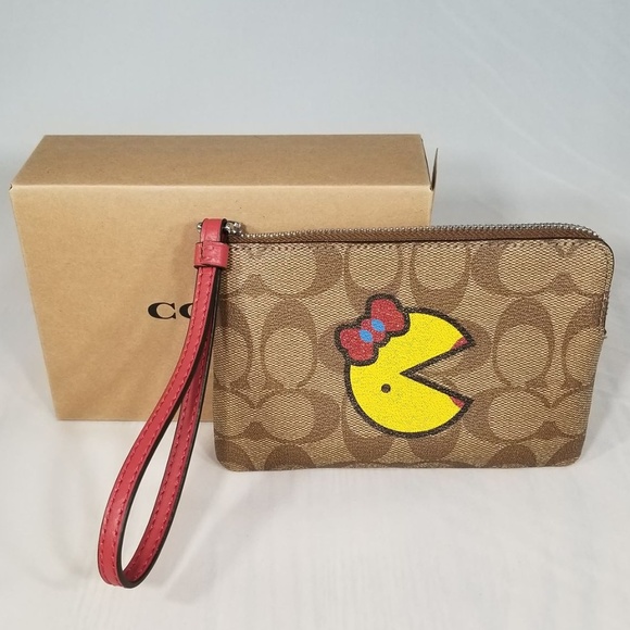 coach pac man wristlet
